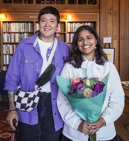 Librarian Sine Hwang Jensen, left, and student Sharanya Sahu pose for a photo in Morrison Library